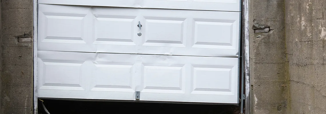 Garage Door Got Hit By A Car Dent Removal in Miramar, FL