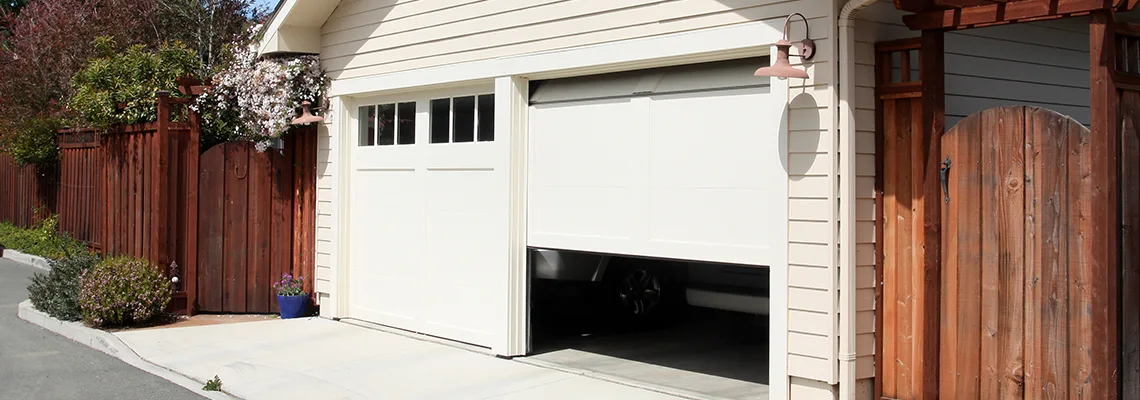 Fix Metal Garage Door Jerking in Miramar